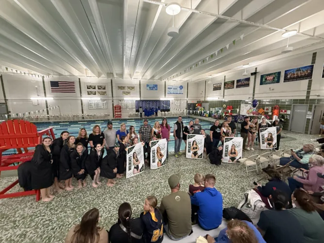 Wildcat swimmers cruise past Oscoda on Senior Night